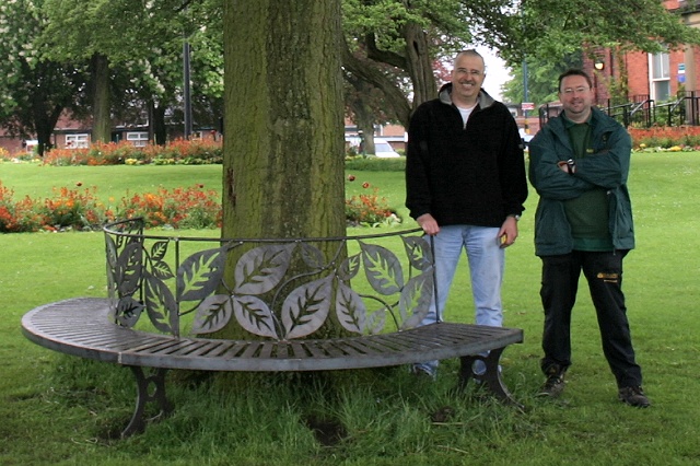 drian Ellis, Park Manager (right), and Mark Whittaker of the Friends of Memorial Park pose with one half of the bench in situ.